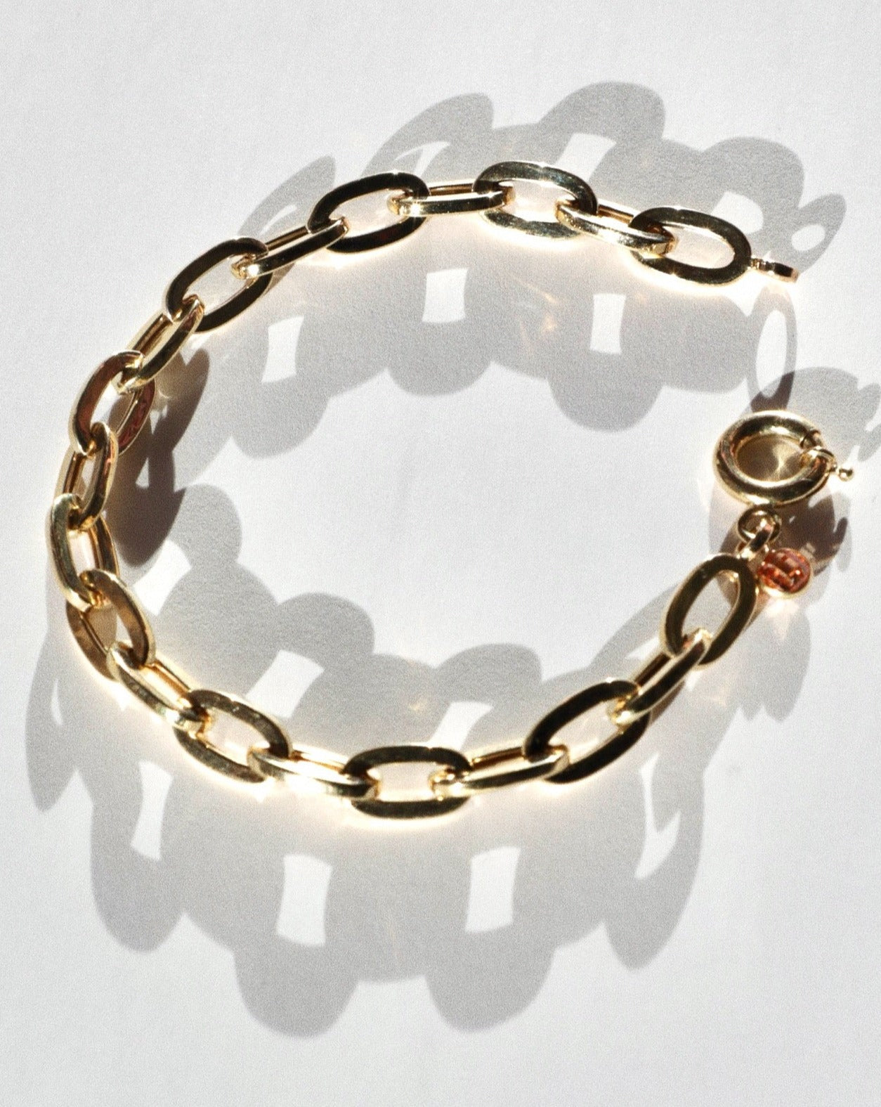 14 karat gold chunky chain bracelet with a chunky spring ring clasp