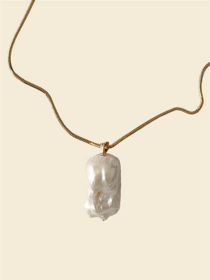 A 14k gold chain necklace with a thin rounded snake chain design, featuring a lobster clasp stamped with 585.