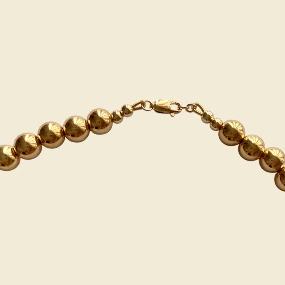 golden_hematite_gemstone_round_beaded_necklace