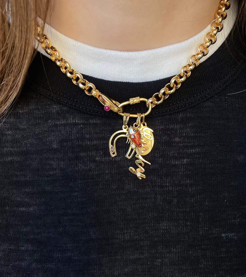 Gold chain necklace with a vintage enamel charm with a birthstone clasp.