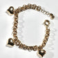 14 karat gold bracelet with heart charms handmade from 14 karat gold